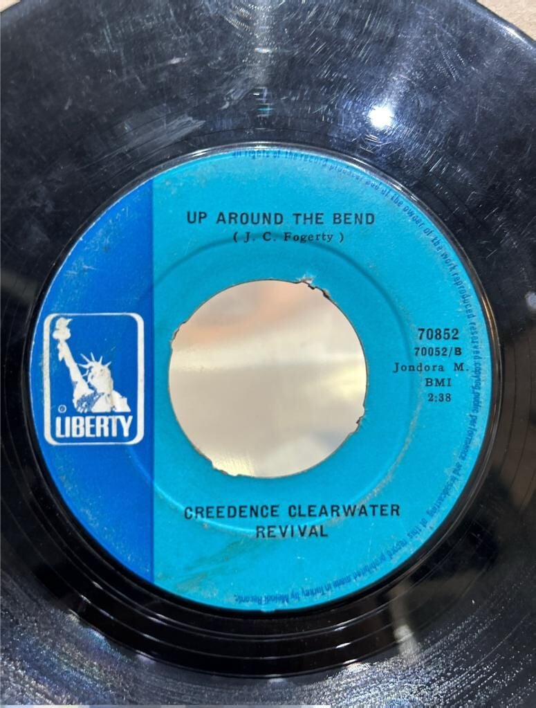 Creedence Clearwater Revival – Run Through The Jungle / Up Around The Bend 1970 BASKI 45LİK