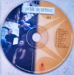 DİKKAT CD Yırtık Uçurtma – İki